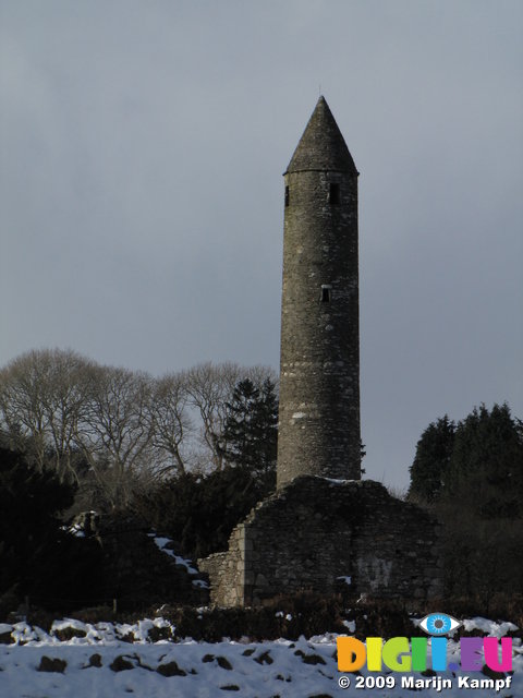 SX02443 Glendalough Round Tower in snow